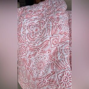 Pink and White Patterned quilt